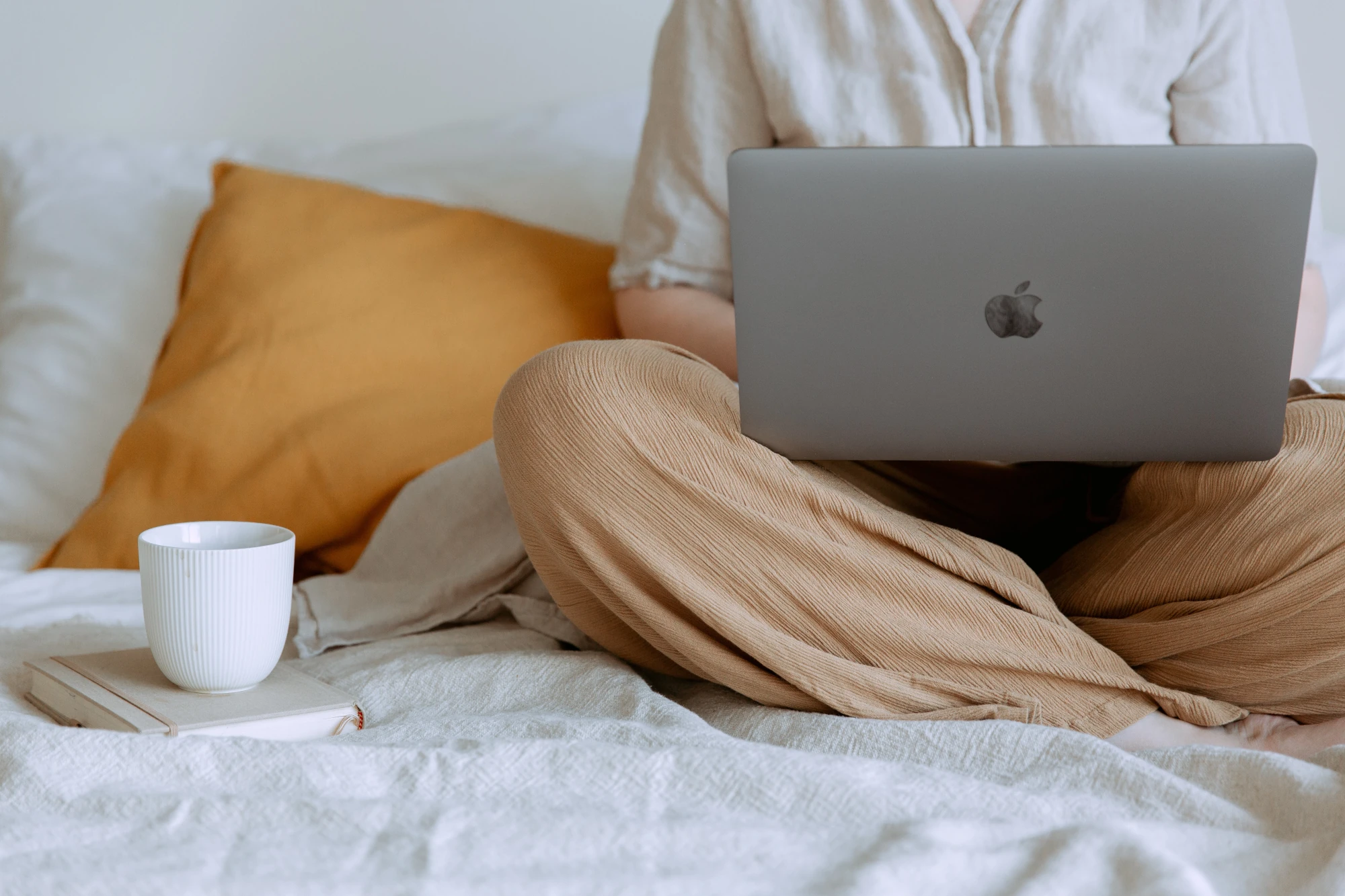 Photo: sitting at laptop.